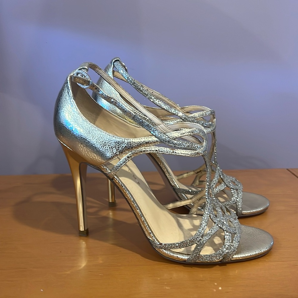Ivanka Trump Leather heels, Gold, Leather.
Gently used ones.
